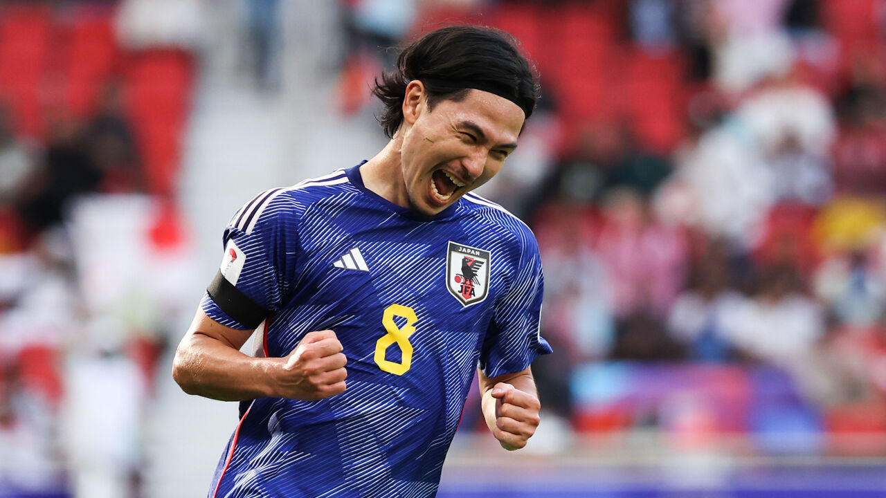 DOHA, QATAR - JANUARY 14: Minamino Takumi #8 of Japan celebrates his second goal during the AFC Asian Cup Group D match between Japan and Vietnam at Al Thumama Stadium on January 14, 2024 in Doha, Qatar.