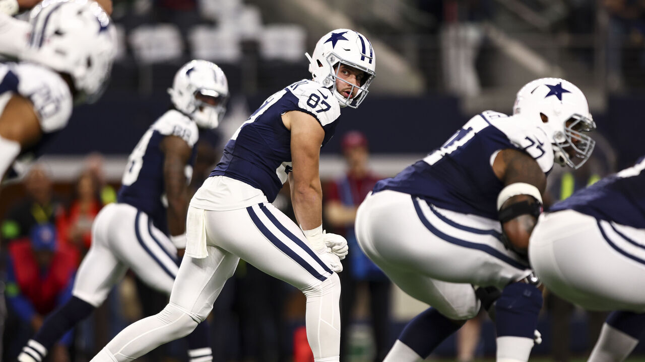 ARLINGTON, TX - NOVEMBER 23: Jake Ferguson #87 of the Dallas Cowboys during an NFL football game against the Washington Commanders at AT&T Stadium on November 23, 2023 in Arlington, Texas.