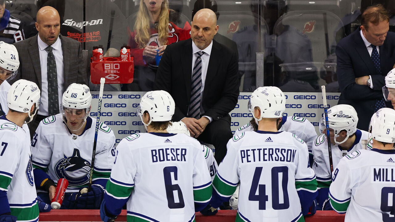 NEWARK, NJ - JANUARY 06: Vancouver Canucks head coach Rick Tocchet chats with his team during a game between the Vancouver Canucks and New Jersey Devils on January 6, 2024 at Prudential Center in the Newark, New Jersey.