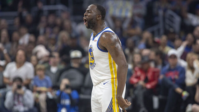 LOS ANGELES, CA - DECEMBER 02: Golden State Warriors forward Draymond Green (23) reacts to making a basket in the first half of an NBA basketball game between the Golden State Warriors and Los Angeles Clippers, Saturday, December 2, 2023, at Crypto.com Arena in Los Angeles, California.