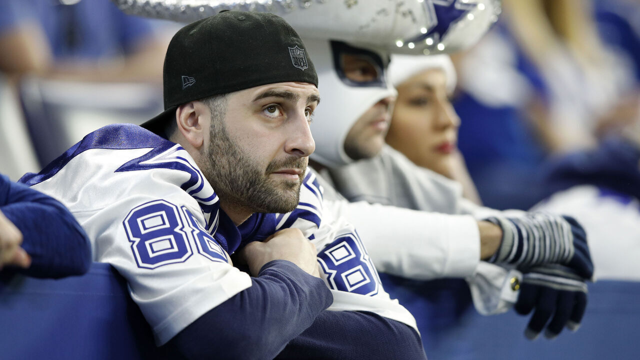 INDIANAPOLIS, INDIANA - DECEMBER 16: A Dallas Cowboys fan disappointed after his team loses to the Indianapolis Colts at Lucas Oil Stadium on December 16, 2018 in Indianapolis, Indiana.