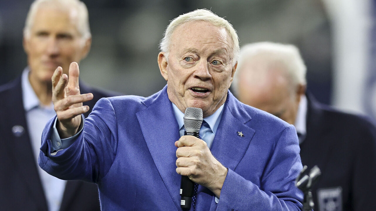 ARLINGTON, TX - DECEMBER 30: Dallas Cowboys owner and GM Jerry Jones welcomes former Dallas Cowboys head coach Jimmy Johnson into the Ring of Honor at halftime of the game between the Dallas Cowboys and the Detroit Lions on December 30, 2023 at AT&T Stadium in Arlington, Texas.