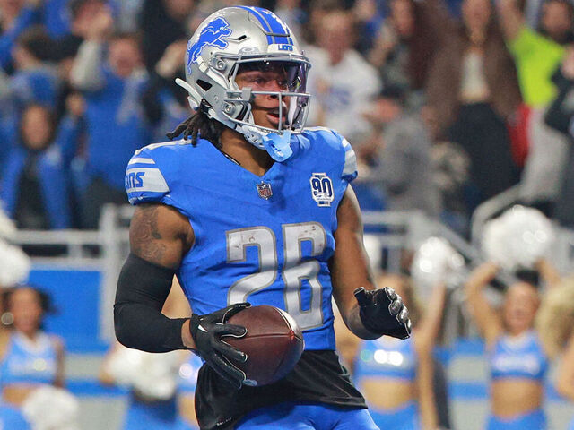 Detroit Lions running back Jahmyr Gibbs (26) scores a touchdown during the first half of the NFC Wild Card Playoffs between the Los Angeles Rams and the Detroit Lions in Detroit, Michigan USA, on Sunday, January 14, 2024.