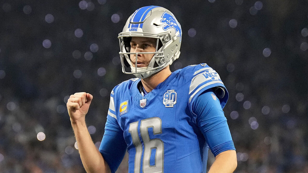 DETROIT, MICHIGAN - JANUARY 14: Jared Goff #16 of the Detroit Lions reacts during the first quarter against the Los Angeles Rams in the NFC Wild Card Playoffs at Ford Field on January 14, 2024 in Detroit, Michigan.