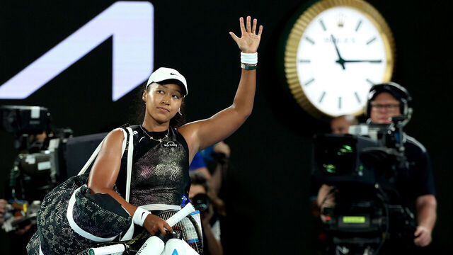 MELBOURNE, AUSTRALIA - JANUARY 15: Naomi Osaka of Japan acknowledges the fans after her loss in the round one singles match against Caroline Garcia of France during the 2024 Australian Open at Melbourne Park on January 15, 2024 in Melbourne, Australia.