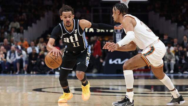 ATLANTA, GA - JANUARY 15: Trae Young #11 of the Atlanta Hawks handles the ball during the game against the San Antonio Spurs on January 15, 2024 at State Farm Arena in Atlanta, Georgia. NOTE TO USER: User expressly acknowledges and agrees that, by downloading and/or using this Photograph, user is consenting to the terms and conditions of the Getty Images License Agreement. Mandatory Copyright Notice: Copyright 2024 NBAE