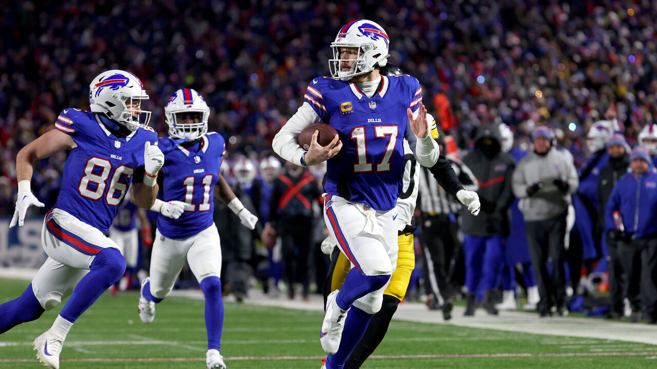 ORCHARD PARK, NEW YORK - JANUARY 15: Josh Allen #17 of the Buffalo Bills scores a 52-yard touchdown against the Pittsburgh Steelers during the second quarter at Highmark Stadium on January 15, 2024 in Orchard Park, New York.