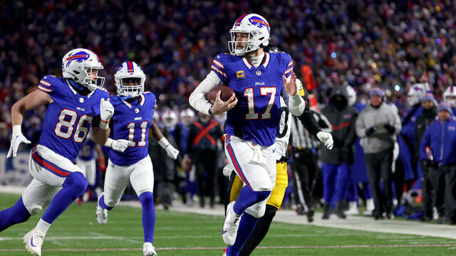 ORCHARD PARK, NEW YORK - JANUARY 15: Josh Allen #17 of the Buffalo Bills scores a 52-yard touchdown against the Pittsburgh Steelers during the second quarter at Highmark Stadium on January 15, 2024 in Orchard Park, New York.