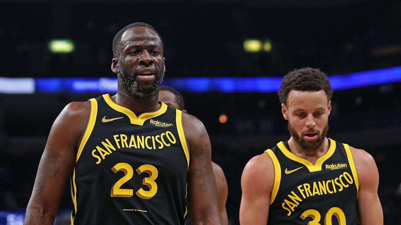 MEMPHIS, TENNESSEE - JANUARY 15: Draymond Green #23 of the Golden State Warriors and Stephen Curry #30 of the Golden State Warriors walk off the court during the first half against the Memphis Grizzlies at FedExForum on January 15, 2024 in Memphis, Tennessee.