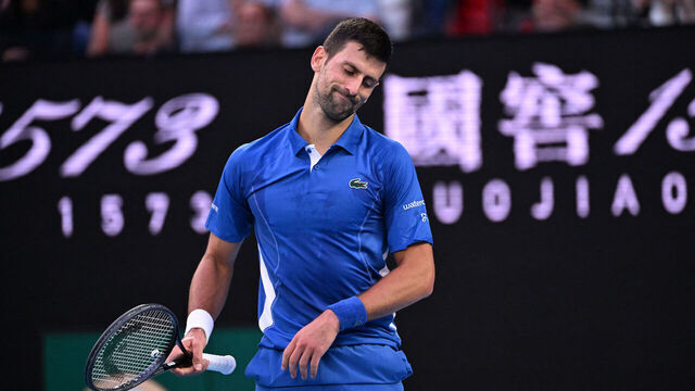 Serbia's Novak Djokovic reacts after a point against Croatia's Dino Prizmic during their men's singles match on day one of the Australian Open tennis tournament in Melbourne on January 14, 2024.