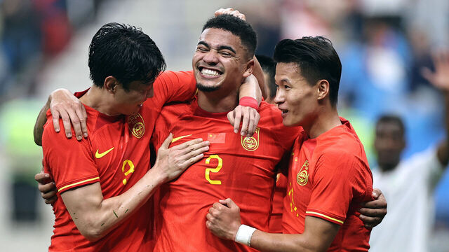DALIAN, CHINA - JUNE 20: Tyias Browning #2 of China celebrates with team mates after scoring his team's second goal during the international friendly match between China and Palestine at Dalian Suoyuwan Football Stadium on June 20, 2023 in Dalian, Liaoning Province of China.