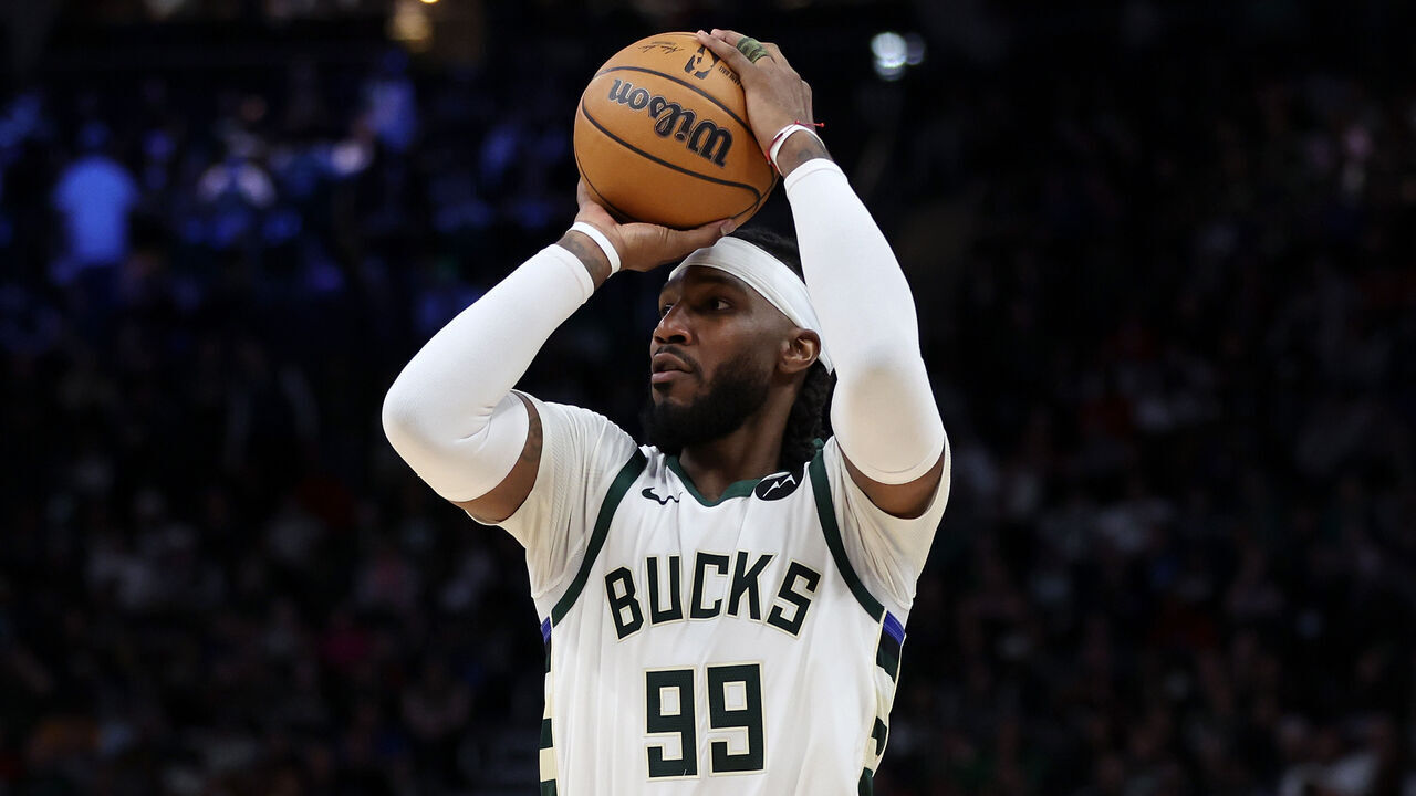 MILWAUKEE, WISCONSIN - NOVEMBER 08: Jae Crowder #99 of the Milwaukee Bucks takes a shot during a game against the Detroit Pistons at Fiserv Forum on November 08, 2023 in Milwaukee, Wisconsin.