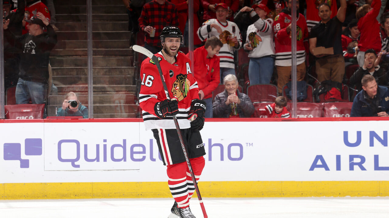 CHICAGO, ILLINOIS - DECEMBER 22: Jason Dickinson #16 of the Chicago Blackhawks reacts after scoring against the Montreal Canadiens in the second period at the United Center on December 22, 2023 in Chicago, Illinois.