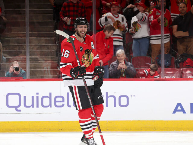 CHICAGO, ILLINOIS - DECEMBER 22: Jason Dickinson #16 of the Chicago Blackhawks reacts after scoring against the Montreal Canadiens in the second period at the United Center on December 22, 2023 in Chicago, Illinois.