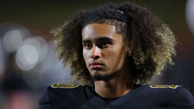 CARROLLTON, GEORGIA - OCTOBER 20: Julian "Ju Ju" Lewis #10 of the Carrollton High School Trojans walks the sidelines against the Westlake High School Lions defender at Grisham Stadium on October 20, 2023 in Carrollton, Georgia. Lewis has committed to the USC Trojans as a 15-year-old Carrollton High School student and is considered one of the top high school quarterback prospects.