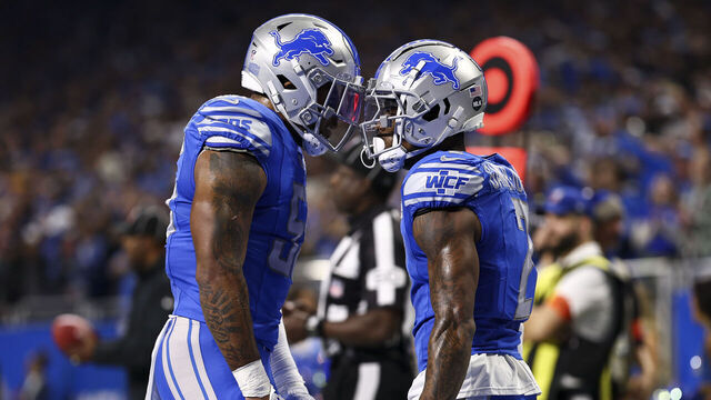DETROIT, MI - JANUARY 14: Derrick Barnes #55 of the Detroit Lions celebrates with Cameron Sutton #1 after a play during the fourth quarter of an NFL wild-card playoff football game against the Los Angeles Rams at Ford Field on January 14, 2024 in Detroit, Michigan.