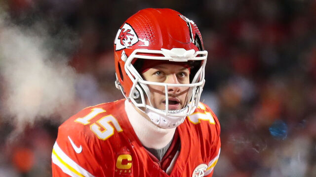 KANSAS CITY, MO - JANUARY 13: Kansas City Chiefs quarterback Patrick Mahomes (15) looks up before the snap in the fourth quarter of an AFC Wild Card playoff game between the Miami Dolphins and Kansas City Chiefs on Jan 13, 2024 at GEHA Field at Arrowhead Stadium in Kansas City, MO.