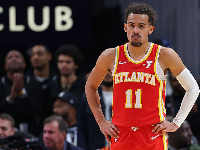 ATLANTA, GEORGIA - DECEMBER 06: Trae Young #11 of the Atlanta Hawks reacts after a missed jumper against the Brooklyn Nets during the fourth quarter at State Farm Arena on December 06, 2023 in Atlanta, Georgia. NOTE TO USER: User expressly acknowledges and agrees that, by downloading and/or using this photograph, user is consenting to the terms and conditions of the Getty Images License Agreement.