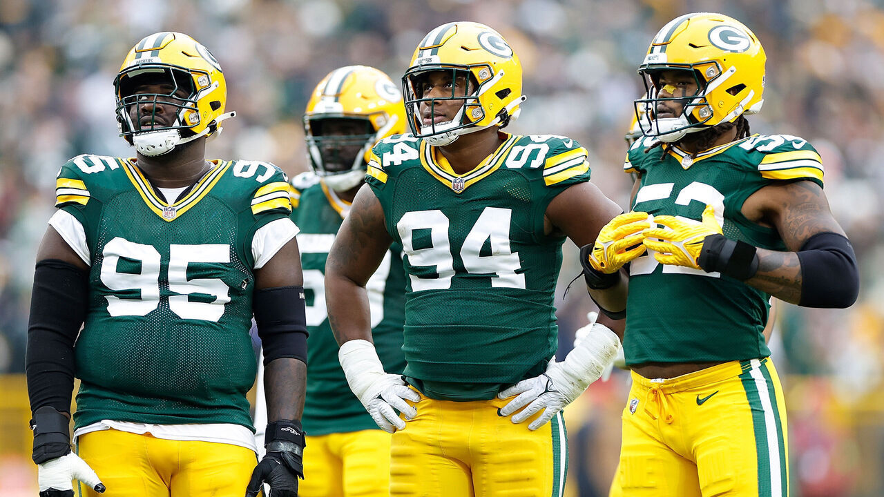 GREEN BAY, WISCONSIN - NOVEMBER 05: (L-R) Devonte Wyatt #95, Karl Brooks #94 and Rashan Gary #52 of the Green Bay Packers look on during the game against the Los Angeles Rams at Lambeau Field on November 05, 2023 in Green Bay, Wisconsin.