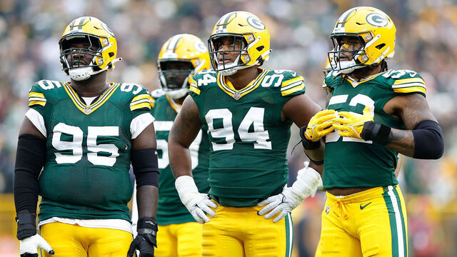 GREEN BAY, WISCONSIN - NOVEMBER 05: (L-R) Devonte Wyatt #95, Karl Brooks #94 and Rashan Gary #52 of the Green Bay Packers look on during the game against the Los Angeles Rams at Lambeau Field on November 05, 2023 in Green Bay, Wisconsin.