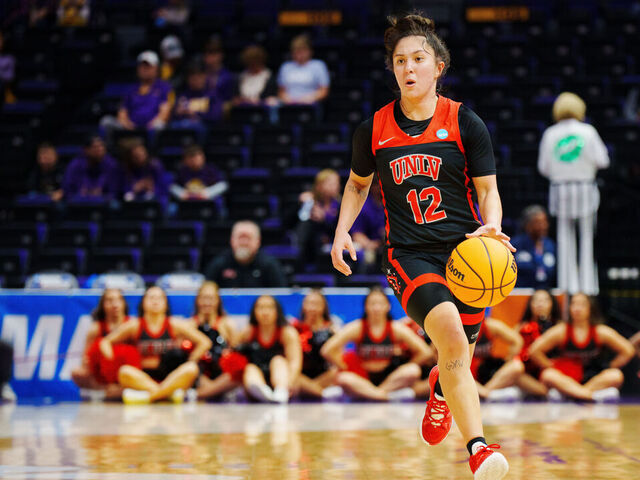 BATON ROUGE, LA - MARCH 17: Alyssa Durazo-Frescas #12 of the UNLV Lady Rebels drives to the basket against the Michigan Wolverines during the first quarter in the first round of the 2023 NCAA Women's Basketball Tournament held at the Pete Maravich Assembly Center on March 17, 2023 in Baton Rouge, Louisiana.
