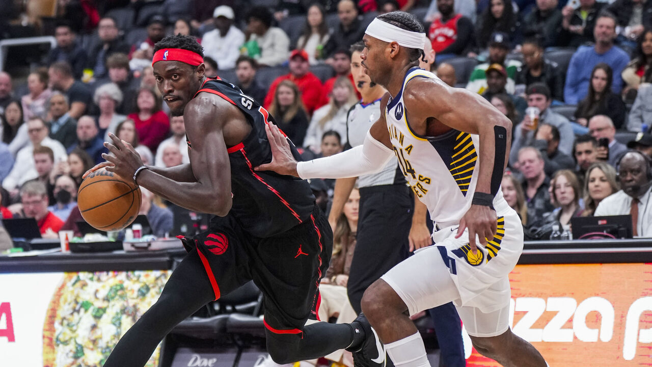TORONTO, ON - MARCH 22: Pascal Siakam #43 of the Toronto Raptors drives against Buddy Hield #24 of the Indiana Pacers during the second half of their basketball game at the Scotiabank Arena on March 22, 2023 in Toronto, Ontario, Canada. NOTE TO USER: User expressly acknowledges and agrees that, by downloading and/or using this Photograph, user is consenting to the terms and conditions of the Getty Images License Agreement.