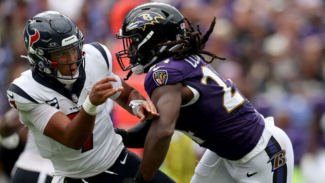 BALTIMORE, MARYLAND - SEPTEMBER 10: Quarterback C.J. Stroud #7 of the Houston Texans is pressured by Jadeveon Clowney #24 of the Baltimore Ravens at M&T Bank Stadium on September 10, 2023 in Baltimore, Maryland.