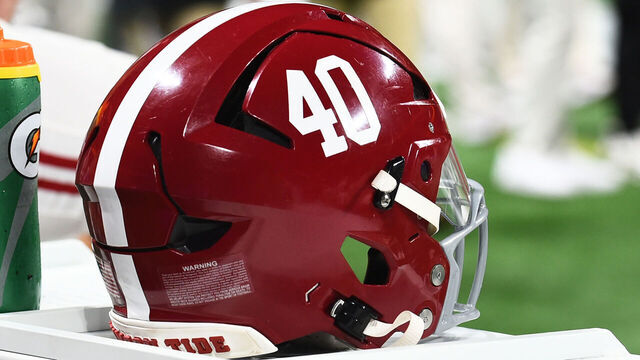 ATLANTA, GA - DECEMBER 02: An Alabama Crimson Tide football helmet sits on the sideline during the SEC Championship Game between the Georgia Bulldogs and the Alabama Crimson Tide on December 02, 2023, at Mercedes-Benz Stadium in Atlanta, GA.