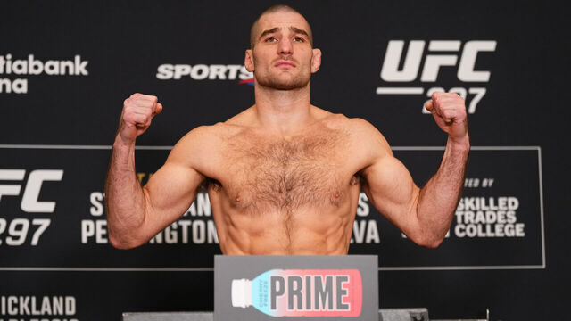 TORONTO, ONTARIO - JANUARY 19: Sean Strickland poses on the scale during the UFC 297 official weigh-in at the Marriott Downtown at CF Eaton Centre on January 19, 2024 in Toronto, Ontario.