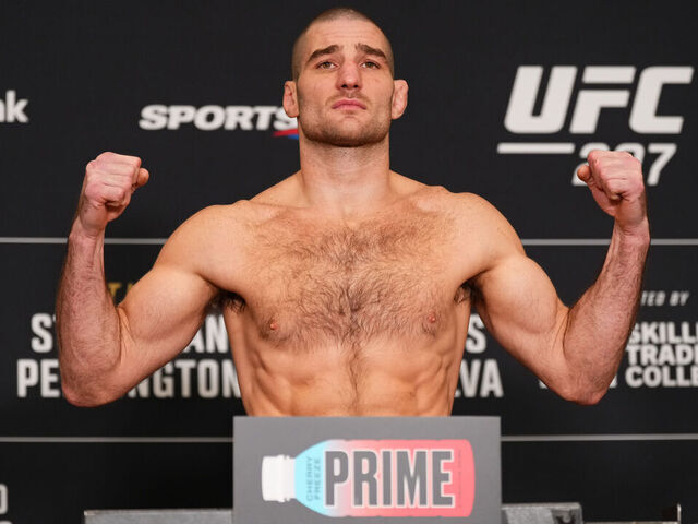TORONTO, ONTARIO - JANUARY 19: Sean Strickland poses on the scale during the UFC 297 official weigh-in at the Marriott Downtown at CF Eaton Centre on January 19, 2024 in Toronto, Ontario.