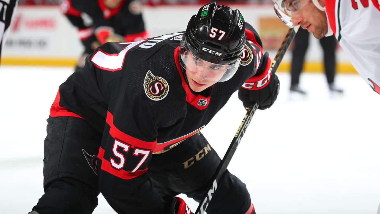 NEWARK, NJ - MARCH 25: Shane Pinto #57 of the Ottawa Senators gets ready to take a faceoff in the second period of the game against the New Jersey Devils at the Prudential Center on March 25, 2023 in Newark, New Jersey.
