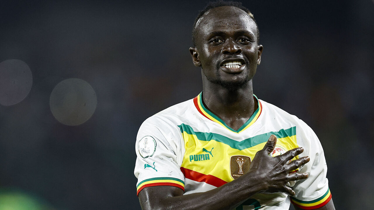 TOPSHOT - Senegal's midfielder #10 Sadio Mane celebrates scoring his team's third goal during the Africa Cup of Nations (CAN) 2024 group C football match between Senegal and Cameroon at the Stade Charles Konan Banny in Yamoussoukro on January 19, 2024.