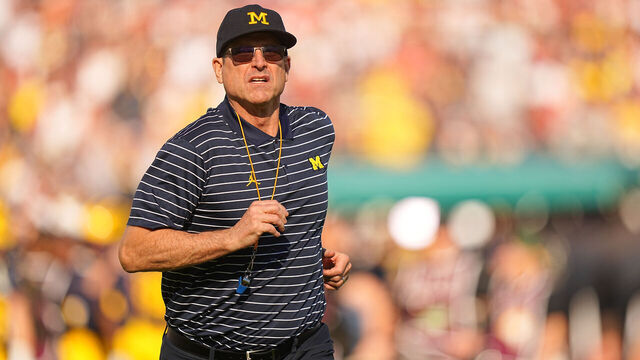 College Football: Rose Bowl: Michigan head coach Jim Harbaugh runs on the field vs Alabama at the Rose Bowl. Pasadena, FL 1/1/2024 CREDIT: Erick W. Rasco (Set Number: X164471 TK1)