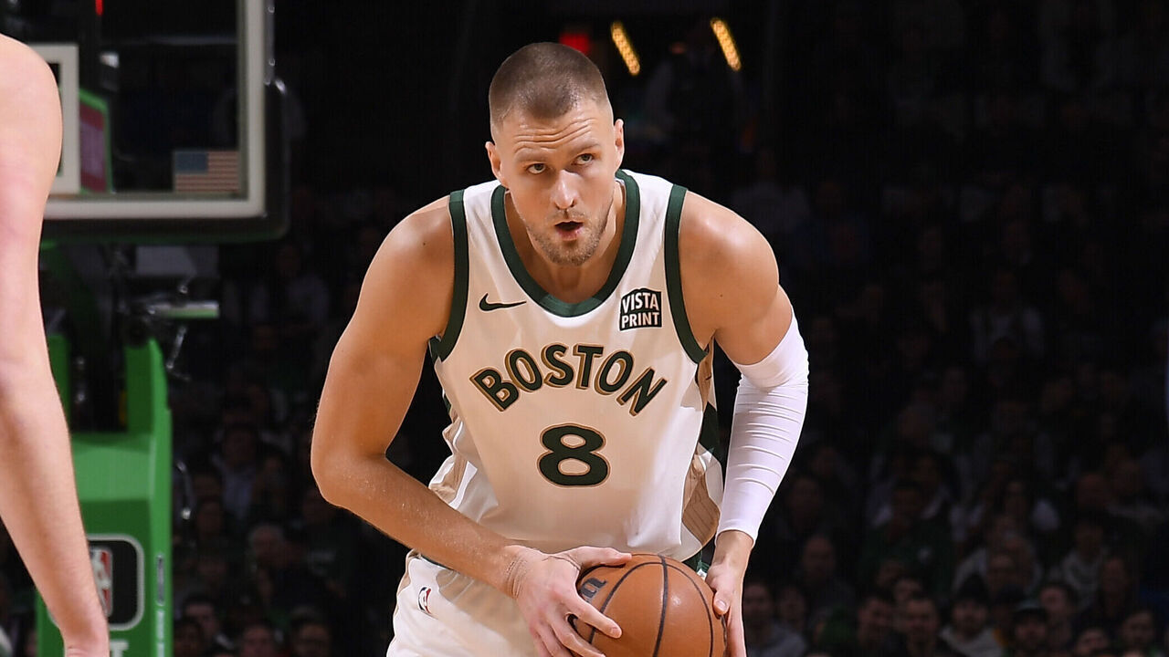 BOSTON, MA - JANUARY 19: Kristaps Porzingis #8 of the Boston Celtics handles the ball during the game against the Denver Nuggets on January 19, 2024 at the TD Garden in Boston, Massachusetts. Mandatory Copyright Notice: Copyright 2024 NBAE