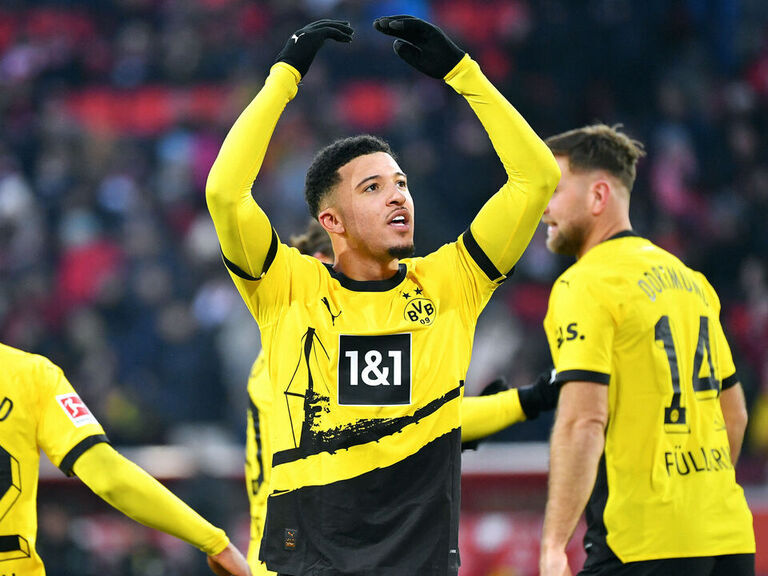 dortmund-demolish-koln-in-match-delayed-by-protest-over-foreign
