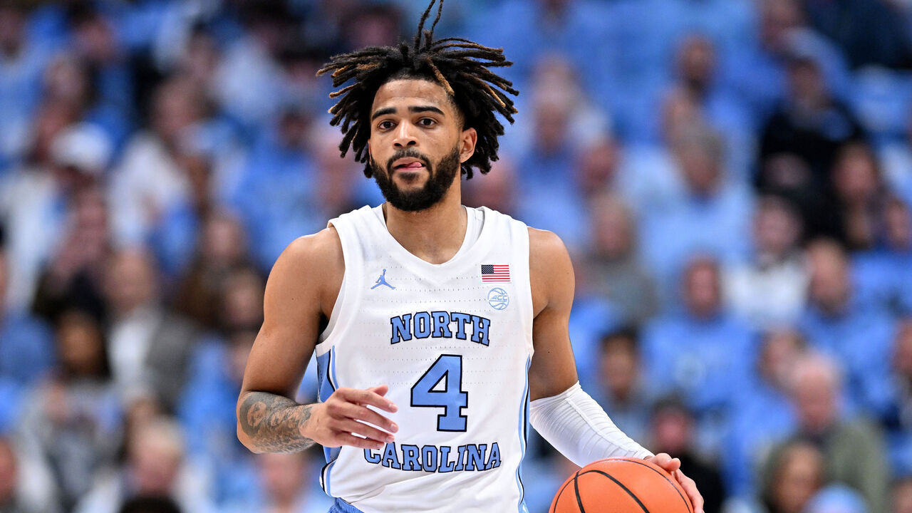 CHAPEL HILL, NORTH CAROLINA - JANUARY 17: RJ Davis #4 of the North Carolina Tar Heels moves the ball against the Louisville Cardinals during the game at the Dean E. Smith Center on January 17, 2024 in Chapel Hill, North Carolina. The Tar Heels won 86-70.
