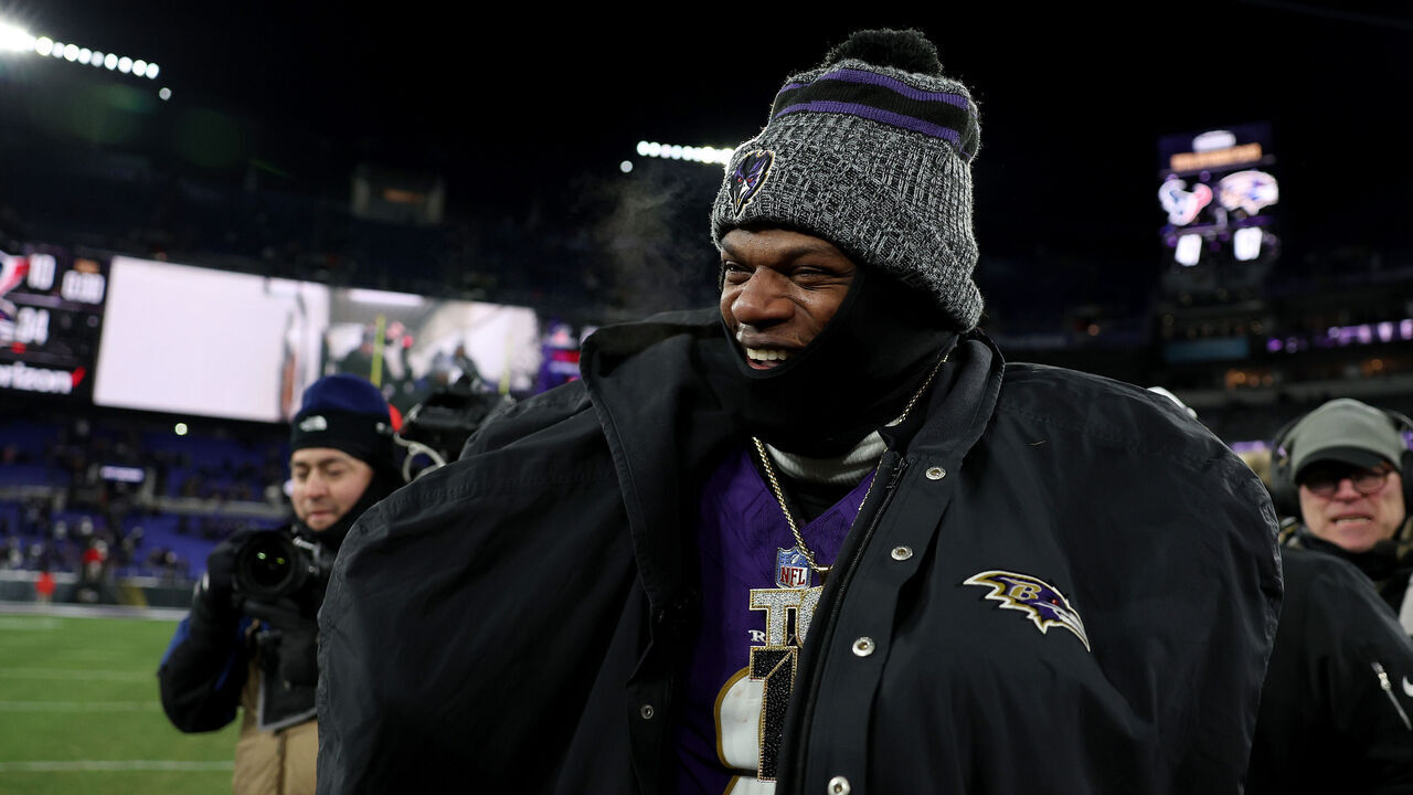 BALTIMORE, MARYLAND - JANUARY 20: Lamar Jackson #8 of the Baltimore Ravens celebrates after defeating the Houston Texans in the AFC Divisional Playoff game at M&T Bank Stadium on January 20, 2024 in Baltimore, Maryland.