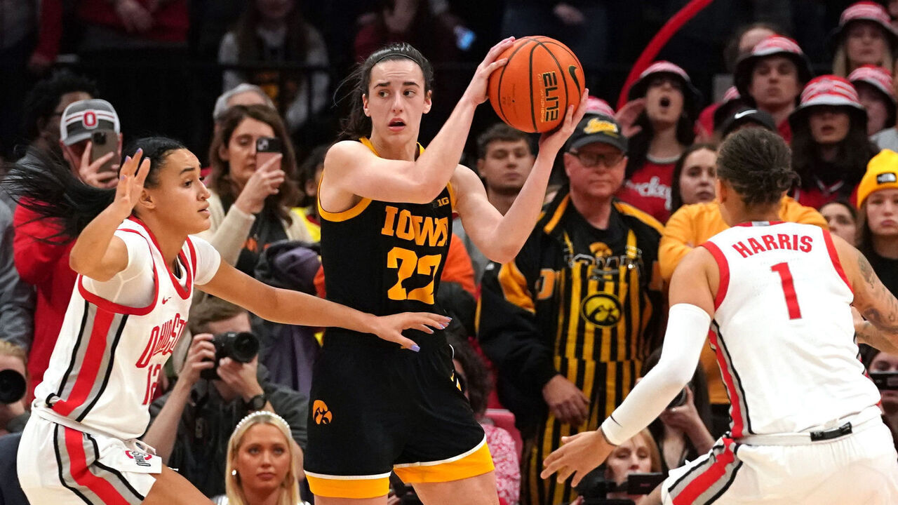 COLUMBUS, OH - JANUARY 21: Iowa Hawkeyes guard Caitlin Clark #22 looks to passes the ball during the second half against the Ohio State Buckeyes at Value City Arena in Columbus, Ohio On January 21, 2024.