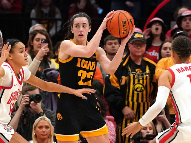 COLUMBUS, OH - JANUARY 21: Iowa Hawkeyes guard Caitlin Clark #22 looks to passes the ball during the second half against the Ohio State Buckeyes at Value City Arena in Columbus, Ohio On January 21, 2024.