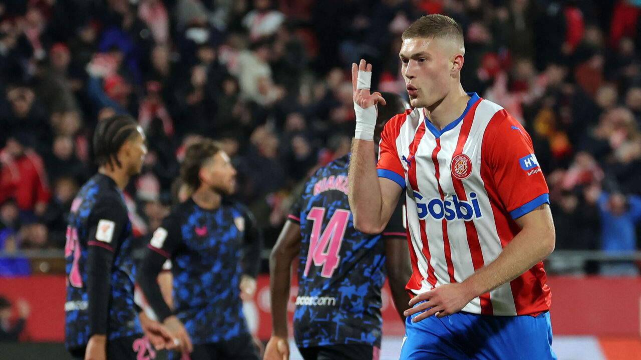Girona's Ukrainian forward #09 Artem Dovbyk celebrates scoring his team's third goal during the Spanish League football match between Girona FC and Sevilla FC at the Montilivi stadium in Girona on January 21, 2024.