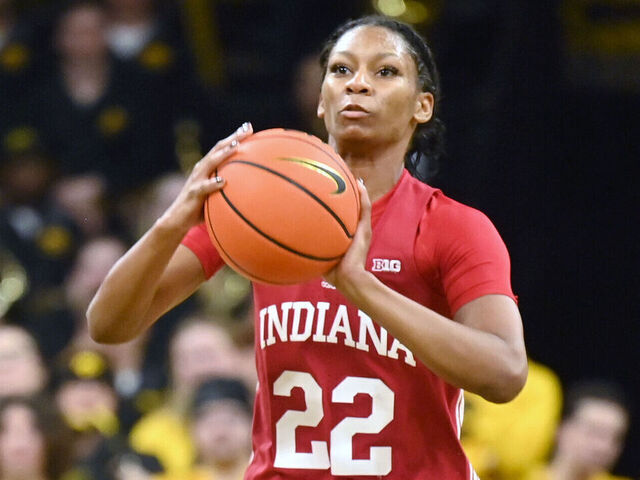 IOWA CITY, IA - JANUARY 13: Indiana guard Chloe Moore-McNeil (22) with the ball during a college women's basketball game between the Indiana Hoosiers and the Iowa Hawkeyes on January 13, 2024, at Carver-Hawkeye Arena in Iowa City, IA.