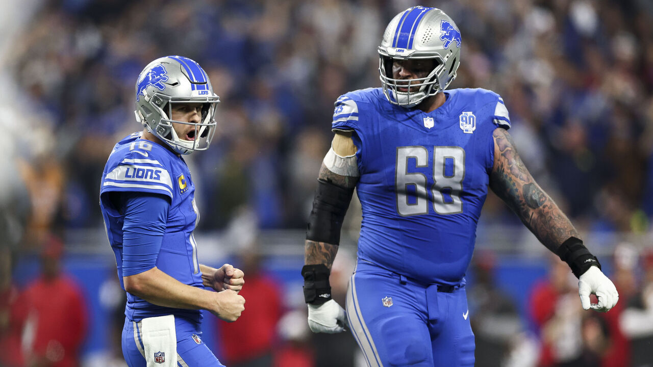 DETROIT, MI - JANUARY 21: Jared Goff #16 of the Detroit Lions celebrates after a touchdown during the second quarter of an NFL divisional round playoff football game against the Tampa Bay Buccaneers at Ford Field on January 21, 2024 in Detroit, Michigan.
