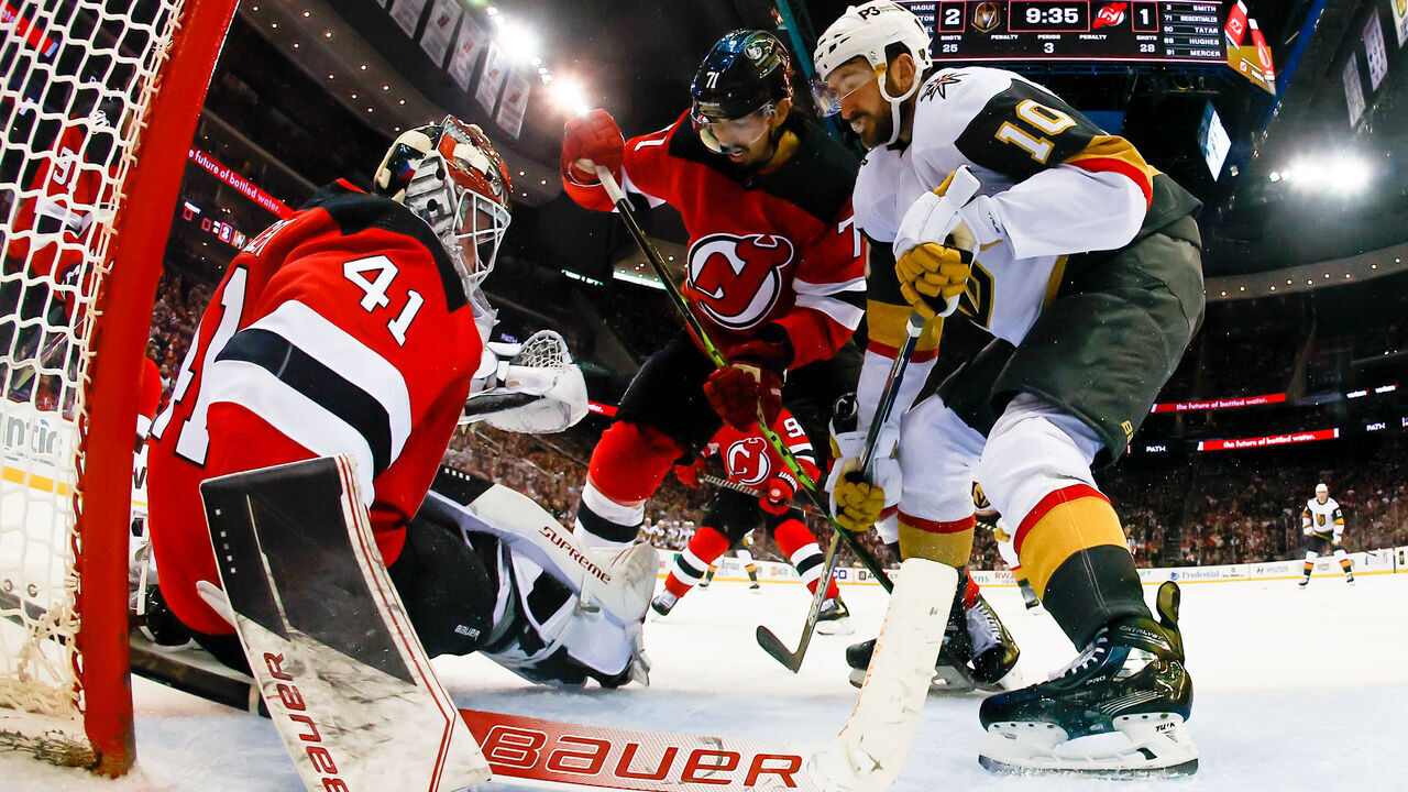 NEWARK, NJ - JANUARY 24: Vitek Vanecek #41 of the New Jersey Devils and Jonas Siegenthaler #71 of the New Jersey Devils defend the net against Nicolas Roy #10 of the Vegas Golden Knights on January 24, 2023 at the Prudential Center in Newark, New Jersey.