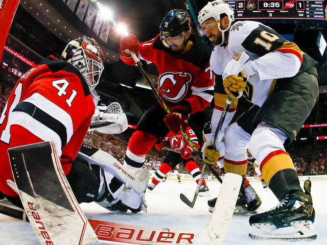NEWARK, NJ - JANUARY 24: Vitek Vanecek #41 of the New Jersey Devils and Jonas Siegenthaler #71 of the New Jersey Devils defend the net against Nicolas Roy #10 of the Vegas Golden Knights on January 24, 2023 at the Prudential Center in Newark, New Jersey.