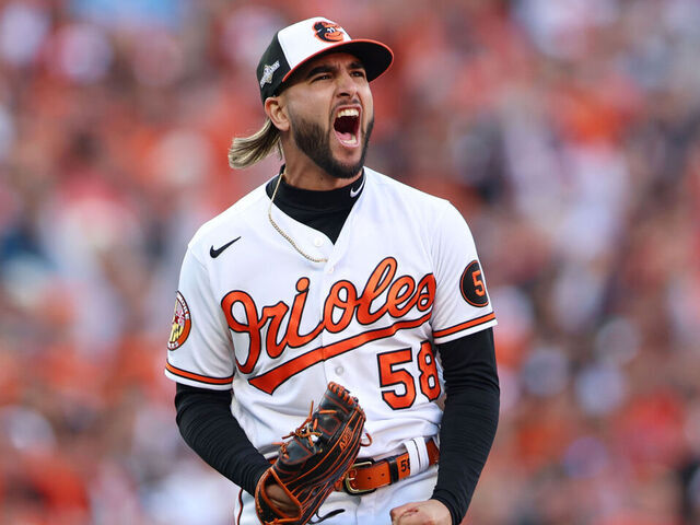 BALTIMORE, MD - OCTOBER 07: Cionel Pérez #58 of the Baltimore Orioles celebrates striking out Adolis García #53 of the Texas Rangers to end the top of the ninth inning during Game 1 of the Division Series between the Texas Rangers and the Baltimore Orioles at Oriole Park at Camden Yards on Saturday, October 7, 2023 in Baltimore, Maryland.