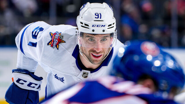 ELMONT, NEW YORK - JANUARY 11: John Tavares #91 of the Toronto Maple Leafs waits for play to begin against the New York Islanders during the second period at UBS Arena on January 11, 2024 in Elmont, New York.