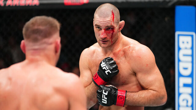 TORONTO, ONTARIO - JANUARY 20: (R-L) Sean Strickland battles Dricus Du Plessis of South Africa in a UFC middleweight championship bout during the UFC 297 event at Scotiabank Arena on January 20, 2024 in Toronto, Ontario.