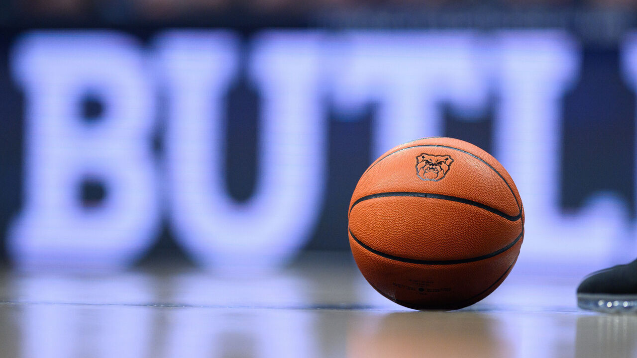 INDIANAPOLIS, IN - JANUARY 05: A basketball with the Butler Bulldogs logo sits on the court during the men's college basketball game between the Butler Bulldogs and UConn Huskies on January 5, 2024, at Hinkle Fieldhouse in Indianapolis, IN.