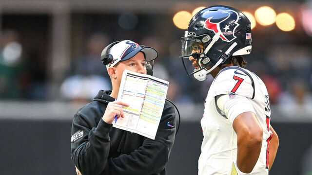 ATLANTA, GA OCTOBER 08: Houston quarterback C.J. Stroud (7) talks with offensive coordinator Bobby Slowik during the NFL game between the Houston Texans and the Atlanta Falcons on October 8th, 2023 at Mercedes-Benz Stadium in Atlanta, GA.