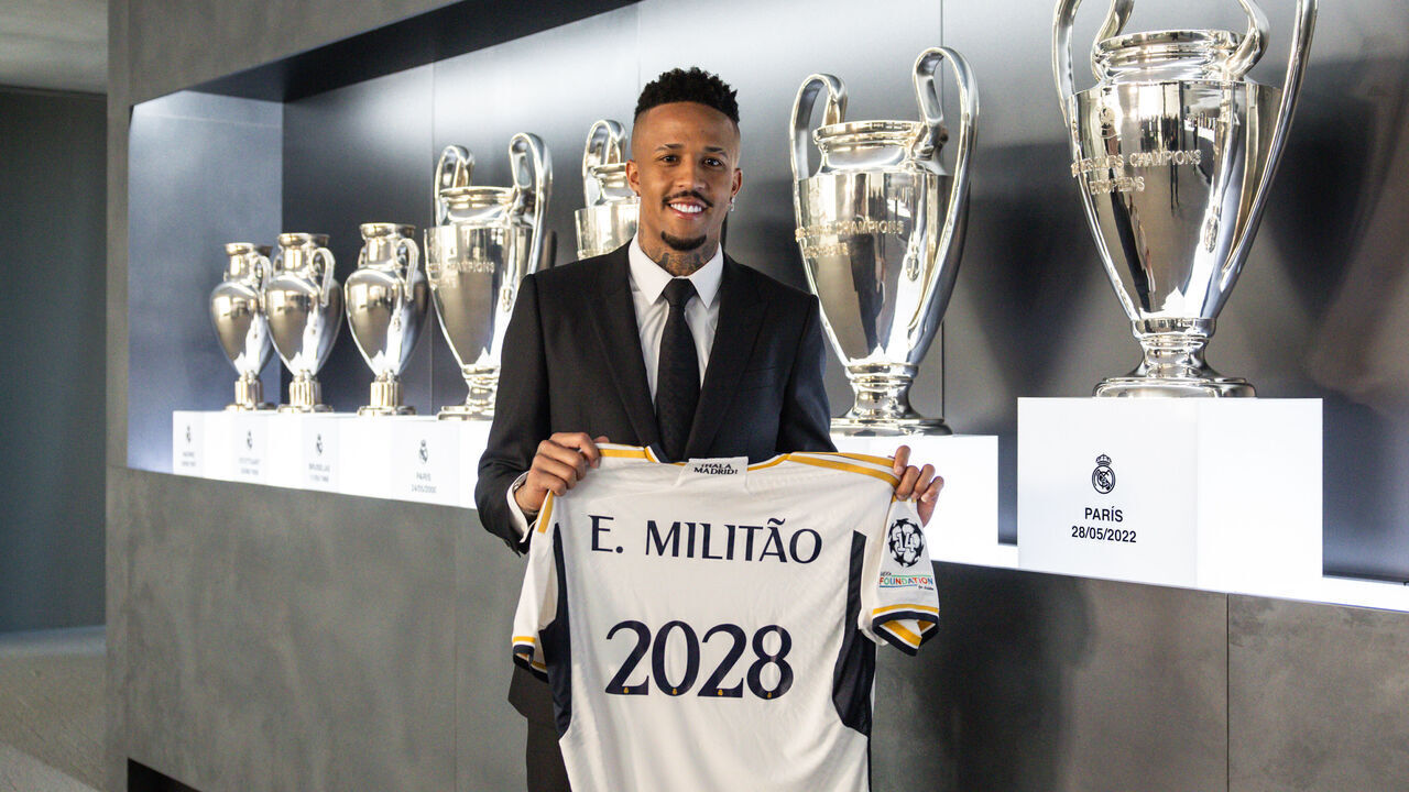 MADRID, SPAIN - JANUARY 23: Eder Militao player of Real Madrid poses with a shirt with 2028 on it as he signs a contract extension at Valdebebas training ground on January 23, 2024 in Madrid, Spain.